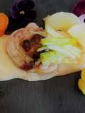 Filet d'agneau sur son lit de haricots blancs et son duo de légumes glacés et croquants