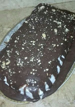 صورة لوصفة تورته شيكولاته بحشوه الكريمه والتين