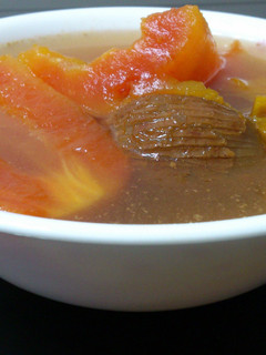 A picture of Papaya And Pumpkin In Pork And Chicken Soup.