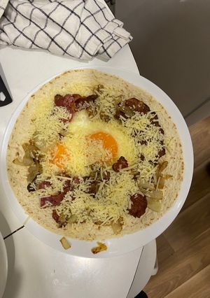 Una foto de “Tarta” de bacon, huevo, cebolla y queso