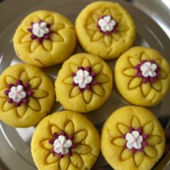 A picture of Dahi, kesar pedaYogurt and saffron peda.