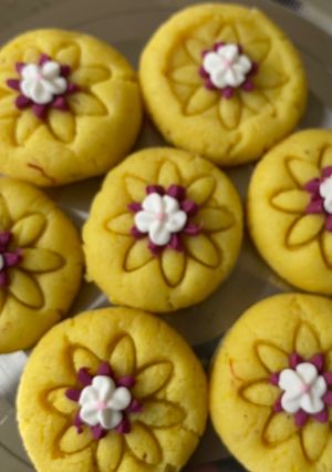 A picture of Dahi, kesar pedaYogurt and saffron peda.
