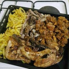 A picture of Fries with grilled matton and wet fried beef.