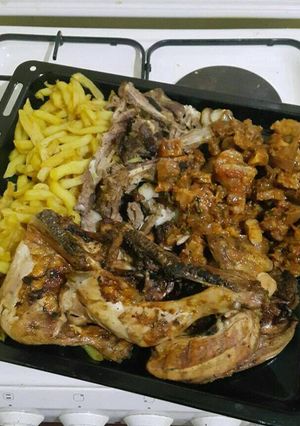 A picture of Fries with grilled matton and wet fried beef.