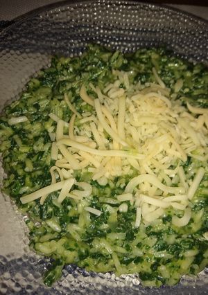 Una foto de Risotto de espinaca y crema
