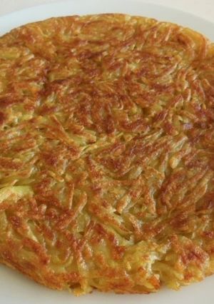 Una foto de Tortilla de papa rallada 😋🤤