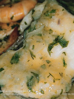 Una foto de Merluza en salsa verde