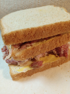 A picture of Skye's cold leftover Cornbeef Sandwich.
