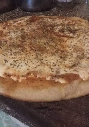 Una foto de Pizza casera🍕!! #CocinaRápidayFácil