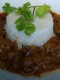Res guisada al picante estilo dominicano.