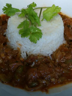 Una foto de Res guisada al picante estilo dominicano.