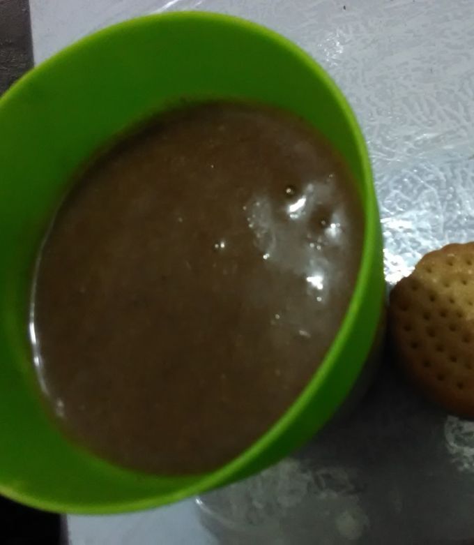 Una foto de Atole de chocolate con masa