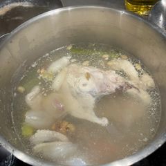 A picture of Cook every part - Chicken broth (with some meat) from chicken back/carcass, and wing tips.