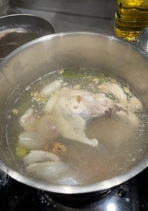 A picture of Cook every part - Chicken broth (with some meat) from chicken back/carcass, and wing tips.