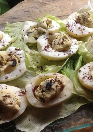 A picture of Devilled eggs with a sprinkling of sumac.
