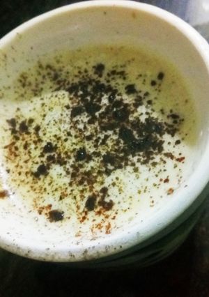 A picture of Instant hot coffee with chocolate powder.
