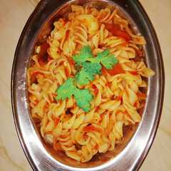 A picture of Red sauce pasta.