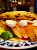 Marinated Salmon Tacos with Mango, Avocado, and Berry Balsamic Glaze