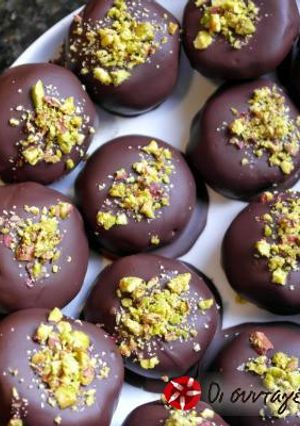 A picture of Kourabiedes with chocolate cover.