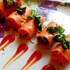 A picture of Gulabi khandvi.
