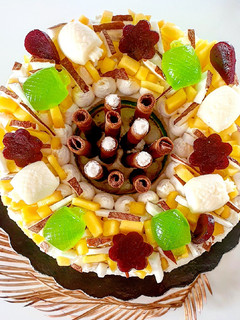 Foto di Tarte alla panna cotta al cocco, mousse di mango e gelee al lime