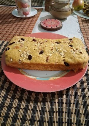 Una foto de Torta de banano con almendras y arándanos