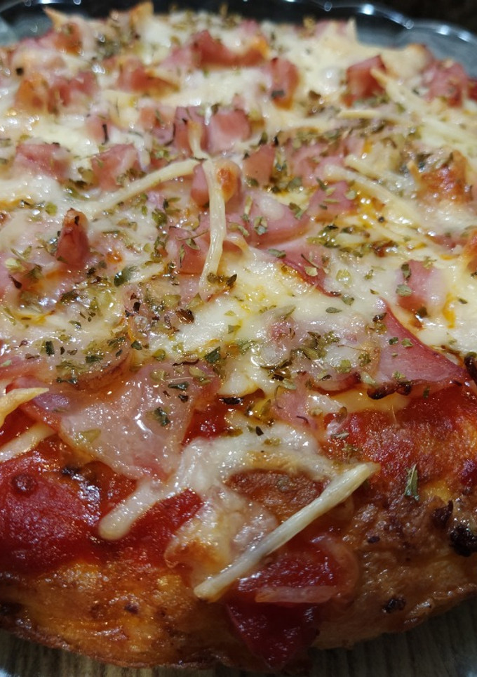 Una foto de Tortipizza de bacon y pavo