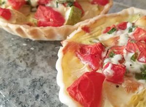 Una foto de Mini tarta de zucchini y tomate