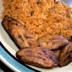 Jollof rice and beans With fried plantain A picture of Jollof rice and beans With fried plantain.