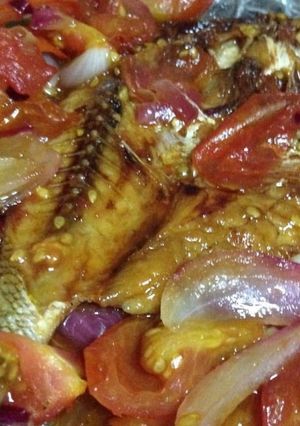 A picture of Dried Fish with Tomatoes.