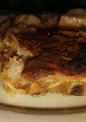 Savanyú káposzta ágyon sült pácolt mustáros oldalas recept fotója