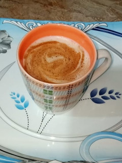 A picture of Frothy creamy coffee.