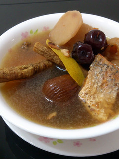 A picture of LG HERBS AND FISH SOUP.