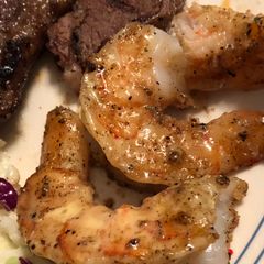 A picture of Grilled garlic butter colossal shrimp.