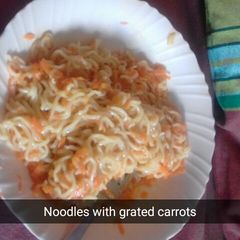 A picture of Chicken flavoured indomie with carrots.