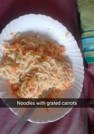 A picture of Chicken flavoured indomie with carrots.