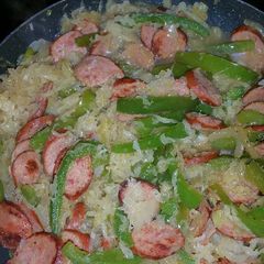 A picture of Bratwurst with Bell Peppers and Sauerkraut.
