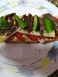 Light Dinner: Toasted Bread Slice with Manchego Cheese and Anchovies