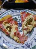 Pizza con tomate fresco