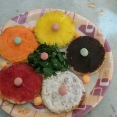 A picture of Multi colour multi flavor canapes.