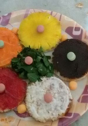 A picture of Multi colour multi flavor canapes.
