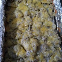 A picture of Cheesy potatoes with hamburger.