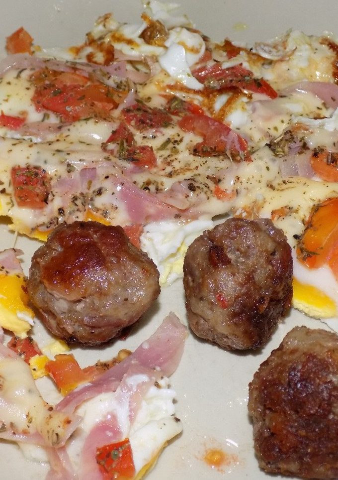 Una foto de Huevos fritos a la pizza