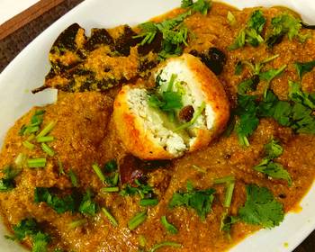 Unique Cuisine Aloo kofta with paneer stuffing in golden gravy Practical Delicious