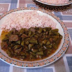 A picture of Okra with Lamb Meat cubes.
