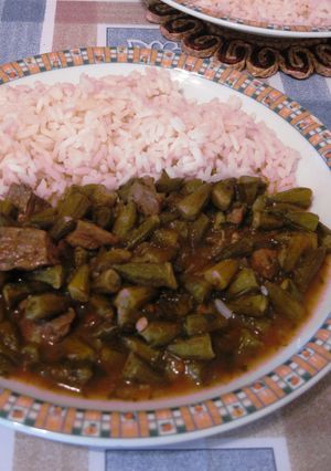 A picture of Okra with Lamb Meat cubes.