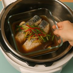 A picture of Steamed Seabass with soy sauce.