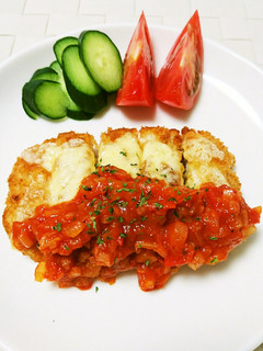 A picture of Pork Cutlet with Tomato Sauce and Cheese.