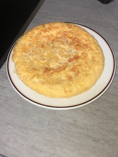 Una foto de Tortilla de cebolla y calabacín