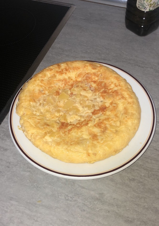 Una foto de Tortilla de cebolla y calabacín